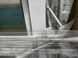 a picture of a window that has been wrapped in plastic