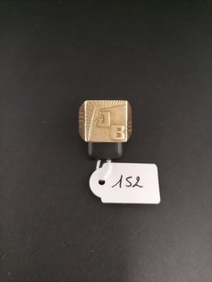 a close up of a key with a tag attached to it
