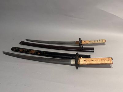 three different types of knives on a white surface