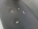 a close up of a remote control on a table