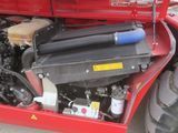 a red truck with a red engine and a red truck with a black engine