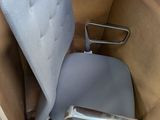 an image of a chair in a cardboard box
