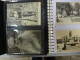 an open book with pictures of people and animals on it