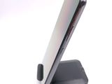 a close up of a cell phone on a stand