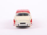 a toy car that is sitting on a white surface
