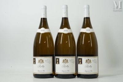 three bottles of wine sitting on top of a table next to each other