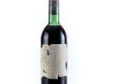 a bottle of wine that is sitting on a table