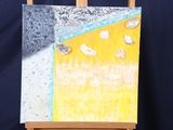 a picture of a painting on a easel with a black background