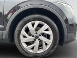 a close up view of a car ' s tire on the road