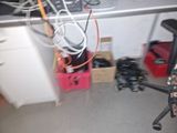 a small room with a lot of wires on the floor