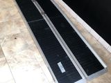 a picture of a metal ramp on a tiled floor