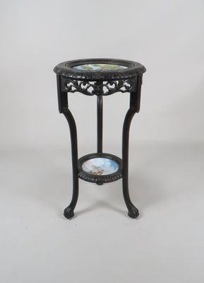 an image of a small table with a plate on it