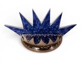candle holder with blue starbursts on a white background