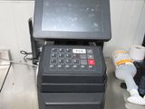 an image of a pos machine sitting on a counter