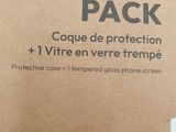 a cardboard box with a picture of a cat inside of it