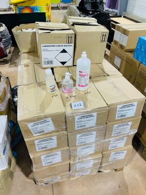 a pile of boxes with a lot of items on top of them