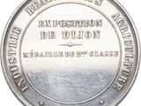 an image of a silver coin with the words exposition de dijon on it