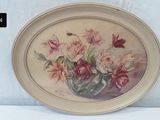 a picture of a painting of flowers on a plate