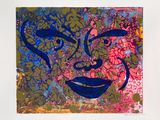 a picture of a painting of a face on a piece of paper