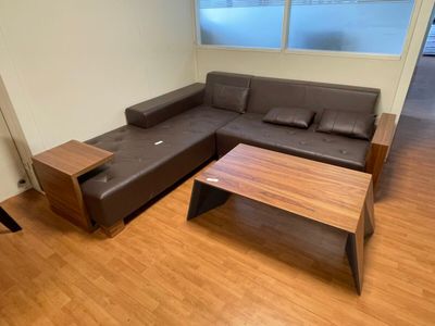 a couch and a coffee table in a living room