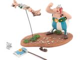 the figurine of a man with a sword and a sword in his hand