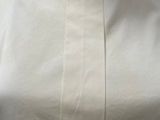 a close up of a white dress on a mannequin mannequin