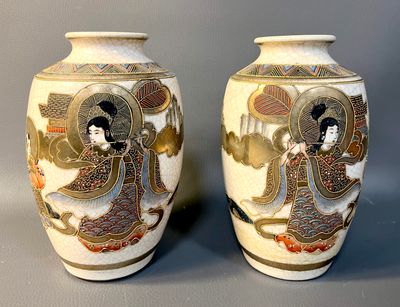 pair of asian style vases with a woman in a kimono dress