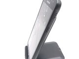 a cell phone that is sitting on top of a stand