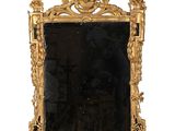une image d'un miroir avec un cadre doré sur un fond blanc