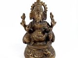 an image of a statue of an elephant sitting on top of a table