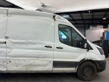 a white van that is parked in a garage