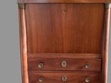 une armoire en bois avec un plateau en marbre sur fond gris