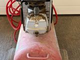 a small machine that is sitting on the floor