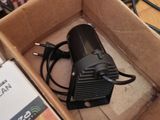 a box that has a light in it on the floor