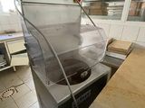 a machine that is sitting on a counter in a kitchen