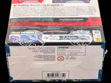 a box of pokemon trading cards on a black background