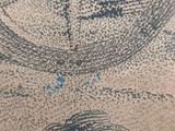 a drawing of a cat that is on a table