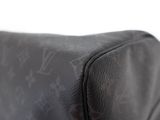 a close up of the back of a louis vuitton bag