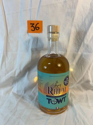 a bottle of rum that is sitting on a table