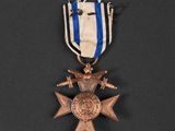 a close up of a medal on a black surface
