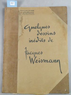 an old book with writing on it sitting on a table