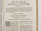 an open book with a black and white image of a dog on it