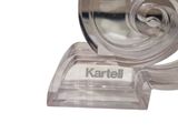 a clear plastic object with a name on it