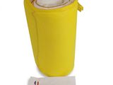 a yellow container with a white bag inside of it