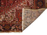 an oriental rug with a red and blue design on a white background