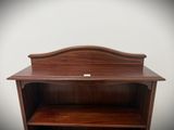an image of a wooden bookcase with a shelf on top of it