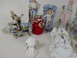 many figurines that are sitting on a table