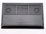 a black air conditioner sitting on a white surface