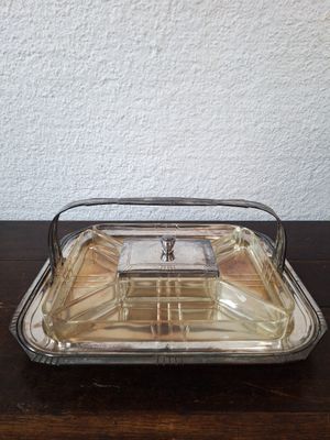 an image of a glass tray with a clock on it