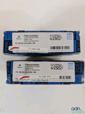 two boxes of blue and white batteries sitting on top of a white surface
